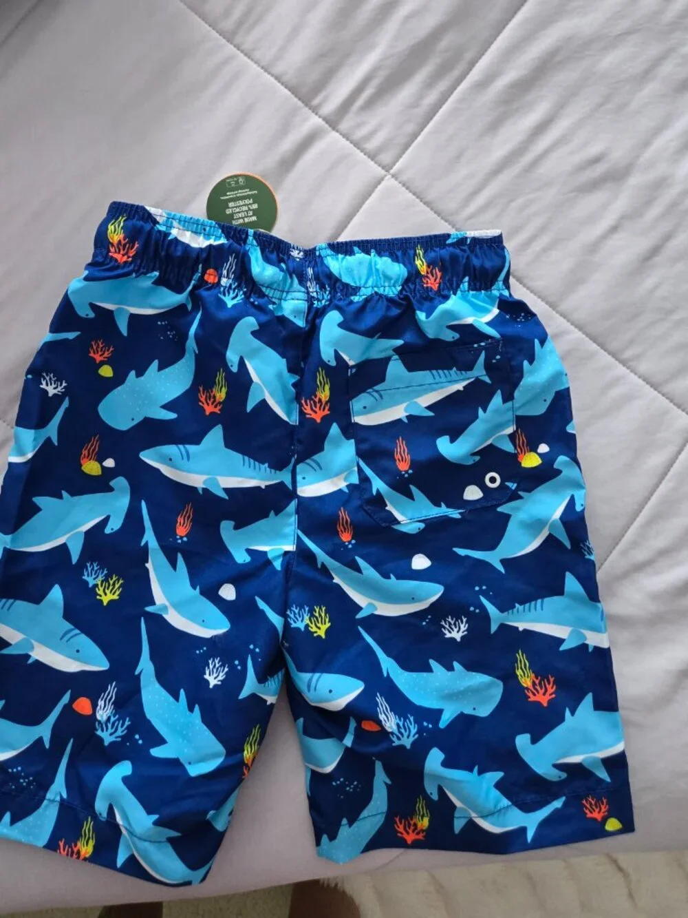 NWT boys 50spf swim shorts L